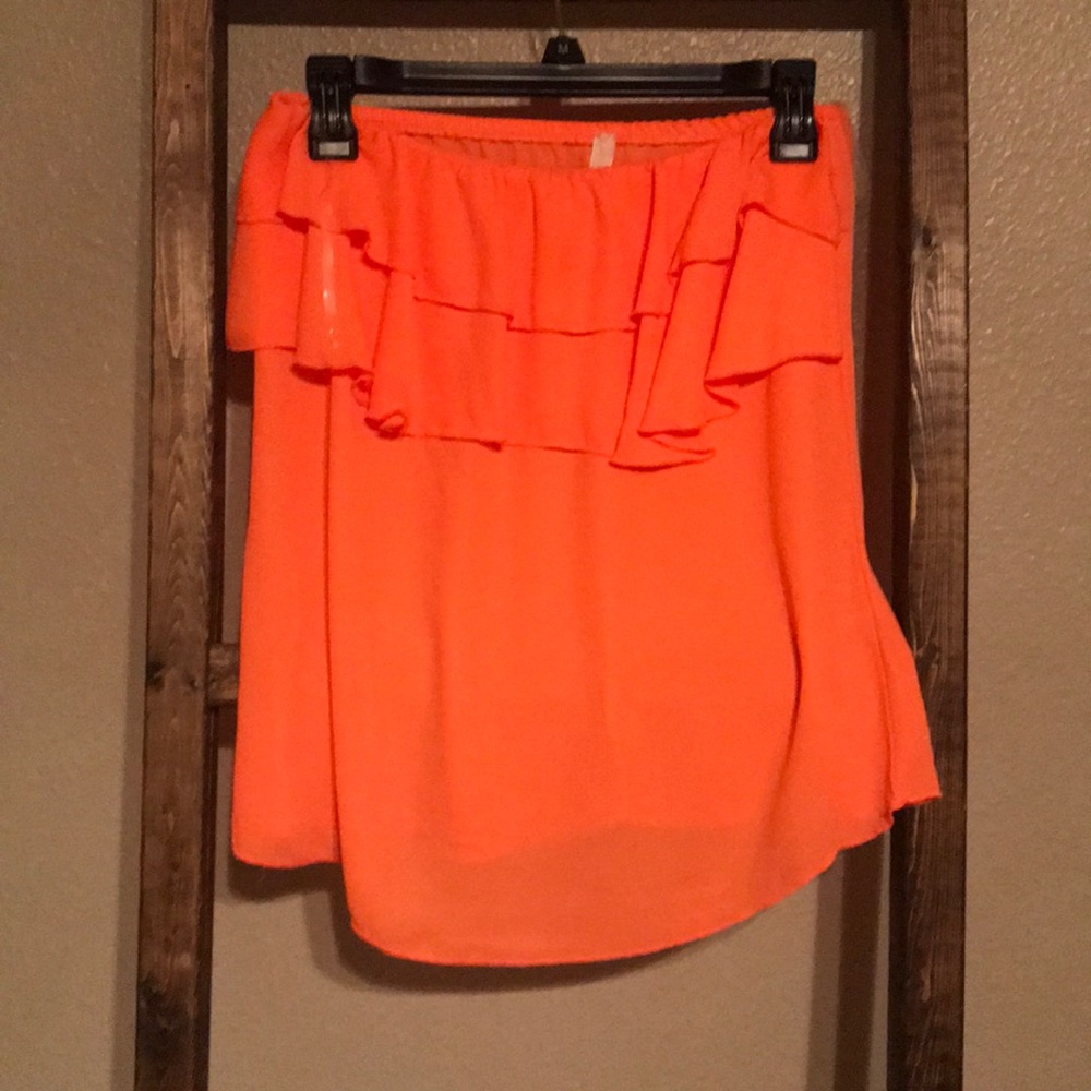 Bright orange ruffle top